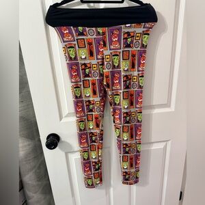 Vibrant Red and Orange Leggings with Comic Print